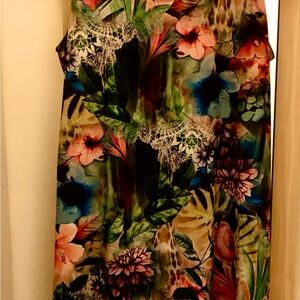 Carmen Marc Volvo Women’s floral top lined dress. Perfect condition.  Elegant.